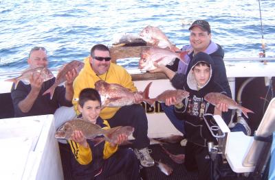 a happy crew after a great days snapper fishing on BROADBILL